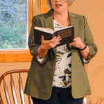 Julie Keefer, Director of Music Ministries, singing