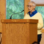 Jean speaking from the pulpit