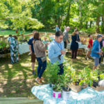 Folks shopping at the outdoor plant sale