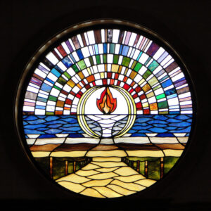 Our new 46-inch stained-glass window created by UUSD member Ron Parks using the artwork of former UUSD congregant and Pioneer, Gabriel Zepecki, as inspiration.