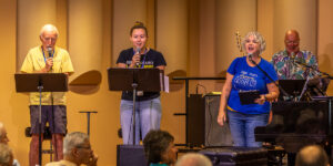 Vocal Team: Paul Barnette, and Lorin Rocheleau sing with Julie Keefer, Director of Music Ministries, and Ron Parks on guitar