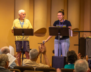 The congregation applauds the Vocal Team.